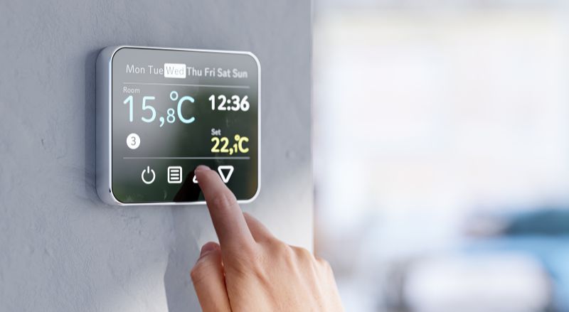 reglage de la temperature ambiante sur thermostat mural grace au thermostat programmable filaire