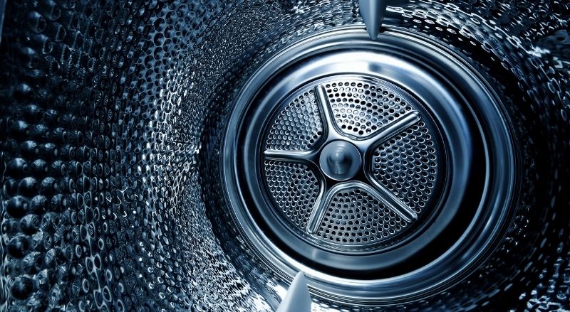 chauffage de l'eau et brassage dans le tambour d'une machine à laver