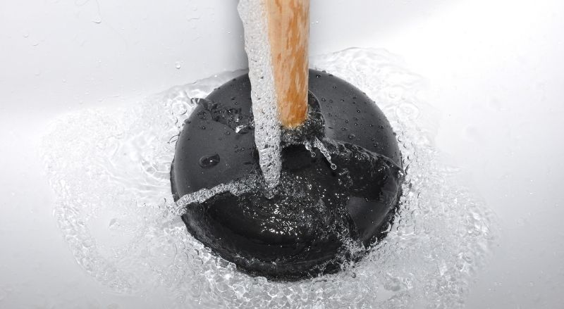 ventouse pour déboucher une douche